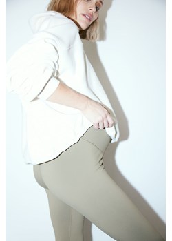 H & M - MAMA Legginsy sportowe Before & After - Zielony ze sklepu H&M w kategorii Spodnie ciążowe - zdjęcie 169678011