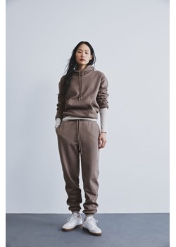 H & M - Spodnie dresowe z domieszką bawełny - Beżowy ze sklepu H&M w kategorii Spodnie damskie - zdjęcie 169680471