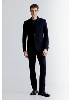 H & M - Spodnie garniturowe Skinny Fit - Niebieski ze sklepu H&M w kategorii Spodnie męskie - zdjęcie 169681423