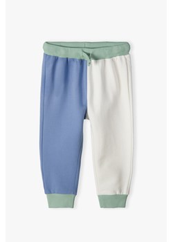Kolorowe spodnie dresowe dla niemowlaka - 5.10.15. ze sklepu 5.10.15 w kategorii Spodnie i półśpiochy - zdjęcie 169685134
