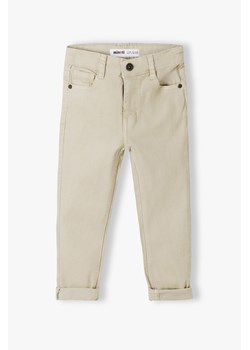 Beżowe spodnie z bawełny dla chłopca ze sklepu 5.10.15 w kategorii Spodnie chłopięce - zdjęcie 169685224
