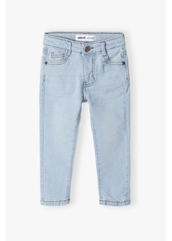Jasnoniebieskie spodnie jeansowe niemowlęce regular ze sklepu 5.10.15 w kategorii Spodnie i półśpiochy - zdjęcie 169685314