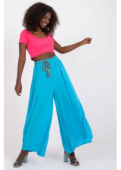 Jasnoniebieskie spodnie z materiału z wysokim stanem OCH BELLA ze sklepu 5.10.15 w kategorii Spodnie damskie - zdjęcie 169685393