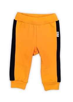Spodnie dresowe chłopięce z lampasami - żółty ze sklepu 5.10.15 w kategorii Spodnie i półśpiochy - zdjęcie 169688301