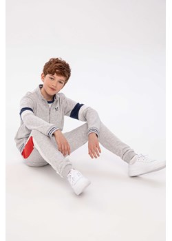 Szare spodnie dresowe dla chłopca ze sklepu 5.10.15 w kategorii Spodnie chłopięce - zdjęcie 169690704