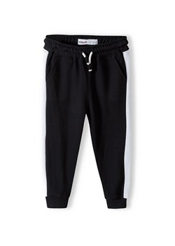 Czarne spodnie dresowe dziewczęce z paskami ze sklepu 5.10.15 w kategorii Spodnie dziewczęce - zdjęcie 169691422