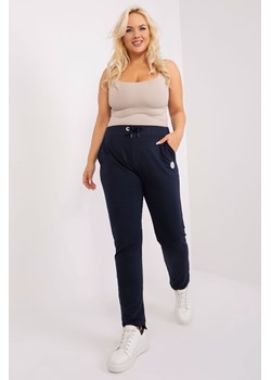 Dresowe spodnie plus size z troczkami granatowy ze sklepu 5.10.15 w kategorii Spodnie damskie - zdjęcie 169692523