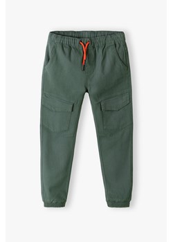 Zielone spodnie joggery dla chłopca ze sklepu 5.10.15 w kategorii Spodnie chłopięce - zdjęcie 169692990