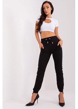 Czarne damskie spodnie dresowe z aplikacją ze sklepu 5.10.15 w kategorii Spodnie damskie - zdjęcie 169695172