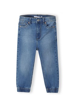 Jeansy o kroju joggerów z elastycznymi mankietami dla niemowlaka ze sklepu 5.10.15 w kategorii Spodnie i półśpiochy - zdjęcie 169700314