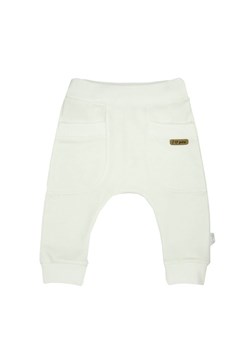 Spodnie dresowe dla dziewczynki typu baggy w kremowym kolorze ze sklepu 5.10.15 w kategorii Spodnie i półśpiochy - zdjęcie 169703443
