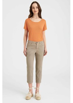 Pomarańczowa bluzka damska z ozdobnym tyłem ze sklepu 5.10.15 w kategorii Bluzki damskie - zdjęcie 169704920