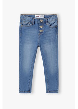 Spodnie jeansowe skinny dla dziewczynki - niebieskie ze sklepu 5.10.15 w kategorii Spodnie dziewczęce - zdjęcie 169709212