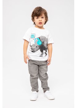 Biały t-shirt bawełniany dla chłopca z nosorożcem ze sklepu 5.10.15 w kategorii T-shirty chłopięce - zdjęcie 169709931