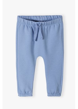 Spodnie dresowe niemowlęce niebieskie - Powerful #Family ze sklepu 5.10.15 w kategorii Spodnie i półśpiochy - zdjęcie 169713423