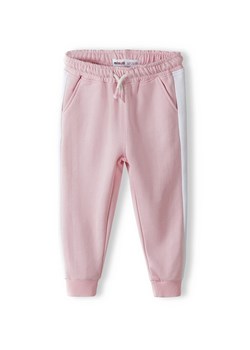 Jasnoróżowe spodnie dresowe dziewczęce z paskami ze sklepu 5.10.15 w kategorii Spodnie dziewczęce - zdjęcie 169714883