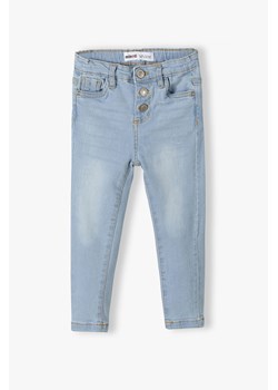 Jasnoniebieskie spodnie jeansowe skinny dla małej dziewczynki ze sklepu 5.10.15 w kategorii Spodnie dziewczęce - zdjęcie 169715804