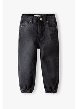 Spodnie jeansowe typu joggery dziewczęce czarne ze sklepu 5.10.15 w kategorii Spodnie dziewczęce - zdjęcie 169719020