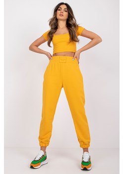 Jasnopomarańczowe spodnie dresowe z kieszeniami RUE PARIS ze sklepu 5.10.15 w kategorii Spodnie damskie - zdjęcie 169721160