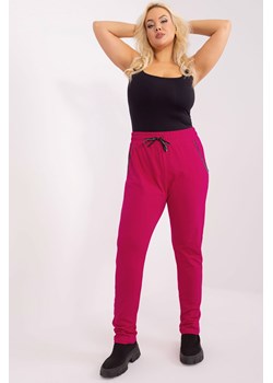 Dresowe spodnie plus size z troczkami fuksjowy ze sklepu 5.10.15 w kategorii Spodnie damskie - zdjęcie 169721692