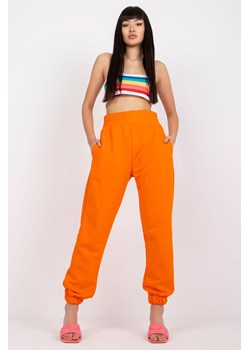 Pomarańczowe spodnie dresowe z kieszeniami RUE PARIS ze sklepu 5.10.15 w kategorii Spodnie damskie - zdjęcie 169728460