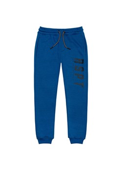 Niebieskie spodnie dresowe dla niemowlaka ze sklepu 5.10.15 w kategorii Spodnie i półśpiochy - zdjęcie 169729933