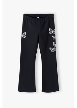 Czarne spodnie dziewczęce typu flare z motylkami ze sklepu 5.10.15 w kategorii Spodnie dziewczęce - zdjęcie 169730614