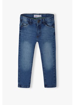Ciemnoniebieskie spodnie jeansowe niemowlęce skinny ze sklepu 5.10.15 w kategorii Spodnie i półśpiochy - zdjęcie 169730852