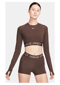 Damska koszulka o skróconym kroju z długim rękawem Dri-FIT Nike Pro - Brązowy ze sklepu Nike poland w kategorii Bluzki damskie - zdjęcie 169754471