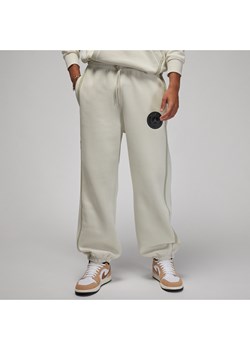 Męskie spodnie z dzianiny Paris Saint-Germain - Szary ze sklepu Nike poland w kategorii Spodnie męskie - zdjęcie 169754541