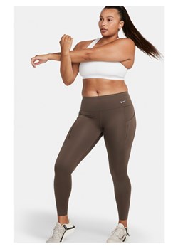 Damskie legginsy o pełnej długości ze średnim stanem i kieszeniami zapewniające mocne wsparcie Nike Go - Brązowy ze sklepu Nike poland w kategorii Spodnie damskie - zdjęcie 169754732