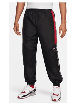 Męskie spodnie z tkaniny Nike Air - Czerń ze sklepu Nike poland w kategorii Spodnie męskie - zdjęcie 169754991
