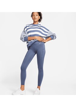 Damskie legginsy ze średnim stanem i kieszeniami o długości 7/8 zapewniające mocne wsparcie Nike Go - Niebieski ze sklepu Nike poland w kategorii Spodnie damskie - zdjęcie 169755150
