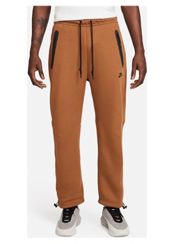 Męskie spodnie dresowe o luźnym kroju u dołu Nike Sportswear Tech Fleece - Brązowy ze sklepu Nike poland w kategorii Spodnie męskie - zdjęcie 169755913
