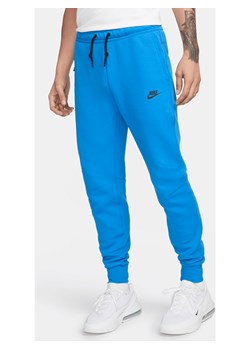 Joggery męskie Nike Sportswear Tech Fleece - Niebieski ze sklepu Nike poland w kategorii Spodnie męskie - zdjęcie 169755932