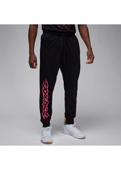 Męskie dzianinowe spodnie z nadrukiem Jordan Dri-FIT Sport - Czerń ze sklepu Nike poland w kategorii Spodnie męskie - zdjęcie 169756284
