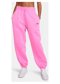 Damskie spodnie dresowe o kroju oversize z wysokim stanem Nike Sportswear Phoenix Fleece - Czerwony ze sklepu Nike poland w kategorii Spodnie damskie - zdjęcie 169756292