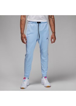 Męskie spodnie z dzianiny Air Jordan Dri-FIT Sport - Niebieski ze sklepu Nike poland w kategorii Spodnie męskie - zdjęcie 169756473