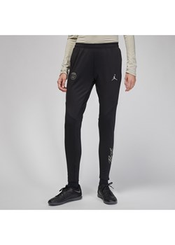 Damskie dzianinowe spodnie piłkarskie Jordan Dri-FIT Paris Saint-Germain Strike (wersja trzecia) - Czerń ze sklepu Nike poland w kategorii Spodnie damskie - zdjęcie 169756794