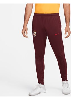 Męskie spodnie piłkarskie Nike Dri-FIT Galatasaray Strike - Czerwony ze sklepu Nike poland w kategorii Spodnie męskie - zdjęcie 169756980