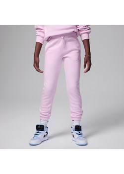 Spodnie dla dużych dzieci Jordan Icon Play Fleece Pants - Różowy ze sklepu Nike poland w kategorii Spodnie dziewczęce - zdjęcie 169757031
