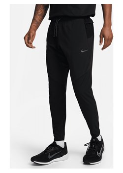 Męskie spodnie do biegania o dopasowanym kroju Nike Dri-FIT Running Division Phenom - Czerń ze sklepu Nike poland w kategorii Spodnie męskie - zdjęcie 169757751