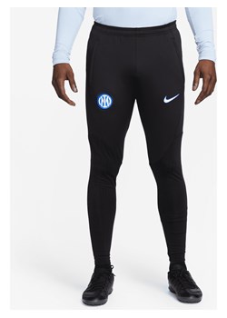 Męskie dzianinowe spodnie piłkarskie Inter Mediolan Strike Nike Dri-FIT - Czerń ze sklepu Nike poland w kategorii Spodnie męskie - zdjęcie 169757931