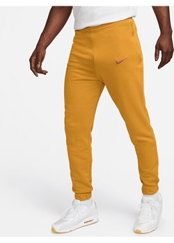 Męskie spodnie z dzianiny dresowej Nike Football Paris Saint-Germain - Brązowy ze sklepu Nike poland w kategorii Spodnie męskie - zdjęcie 169758063