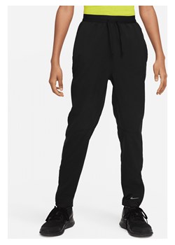 Spodnie treningowe dla dużych dzieci (chłopców) Dri-FIT Nike Multi Tech EasyOn - Czerń ze sklepu Nike poland w kategorii Spodnie męskie - zdjęcie 169758131