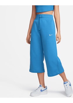 Damskie spodnie dresowe z wysokim stanem o skróconym kroju Nike Sportswear Phoenix Fleece - Niebieski ze sklepu Nike poland w kategorii Spodnie damskie - zdjęcie 169758594