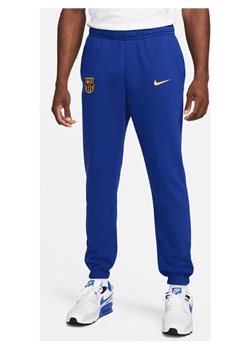 Męskie spodnie z dzianiny dresowej Nike Football FC Barcelona Club - Niebieski ze sklepu Nike poland w kategorii Spodnie męskie - zdjęcie 169759011