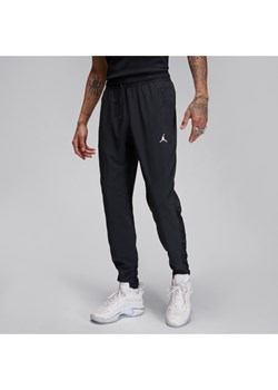 Męskie spodnie z tkaniny Jordan Dri-FIT Sport - Czerń ze sklepu Nike poland w kategorii Spodnie męskie - zdjęcie 169759084