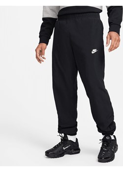 Męskie spodnie z tkaniny na zimę Nike Windrunner - Czerń ze sklepu Nike poland w kategorii Spodnie męskie - zdjęcie 169759210
