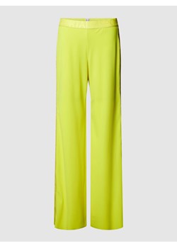 Spodnie materiałowe o rozkloszowanym kroju z elastycznym pasem z logo model ‘ULLI EHRLICH’ ze sklepu Peek&Cloppenburg  w kategorii Spodnie damskie - zdjęcie 169838684